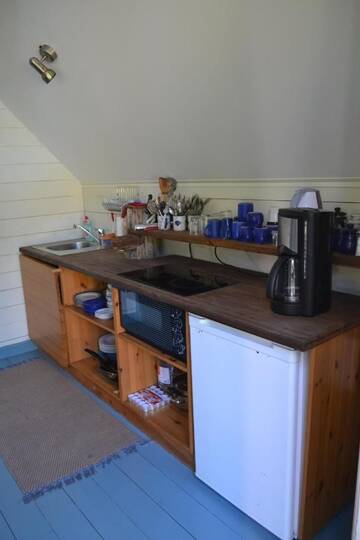 Фото номера Дом с 2 спальнями Дома для отпуска Puumetsa Cottage г. Калана 7